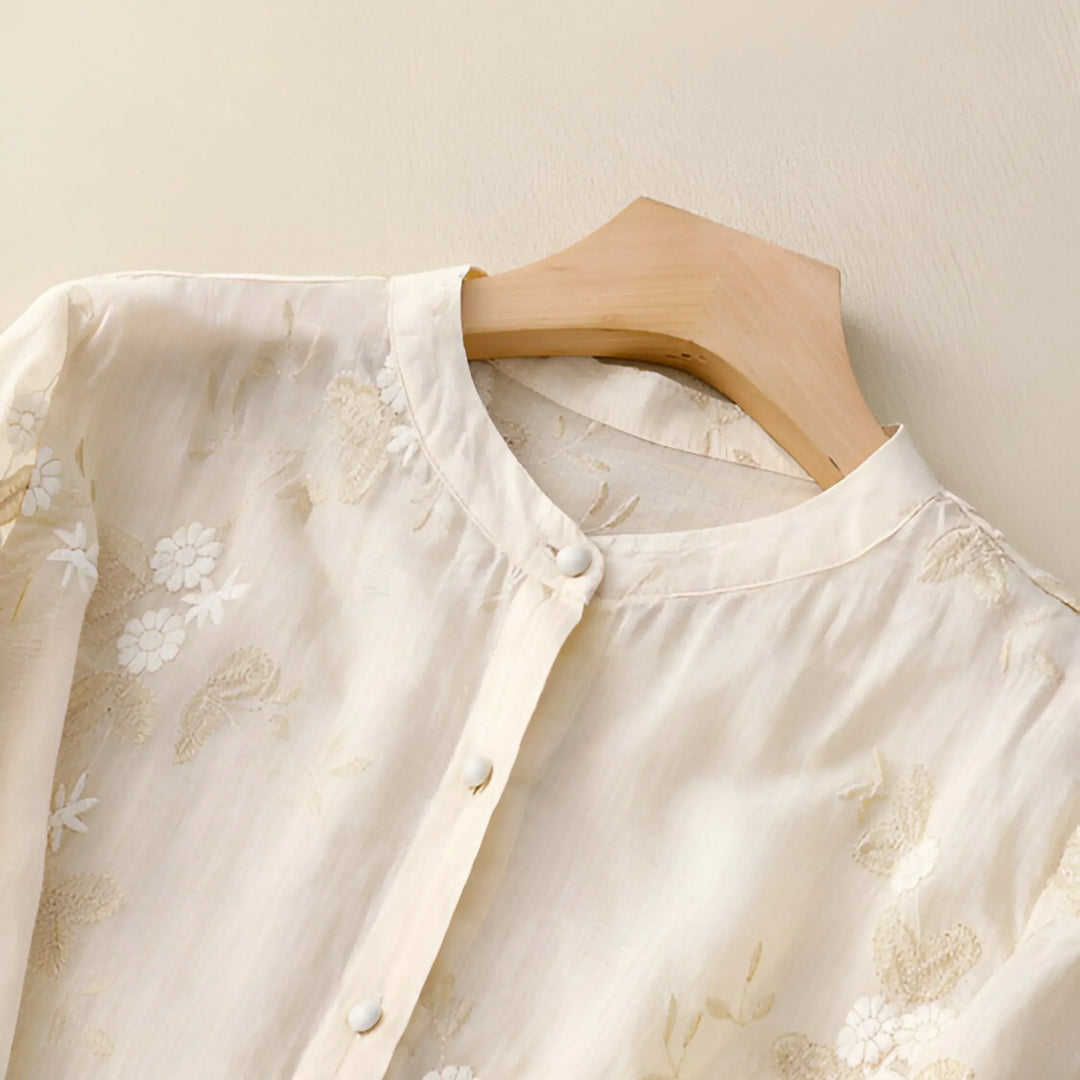 Ula I Embroidered Blouse with Button-Down Design